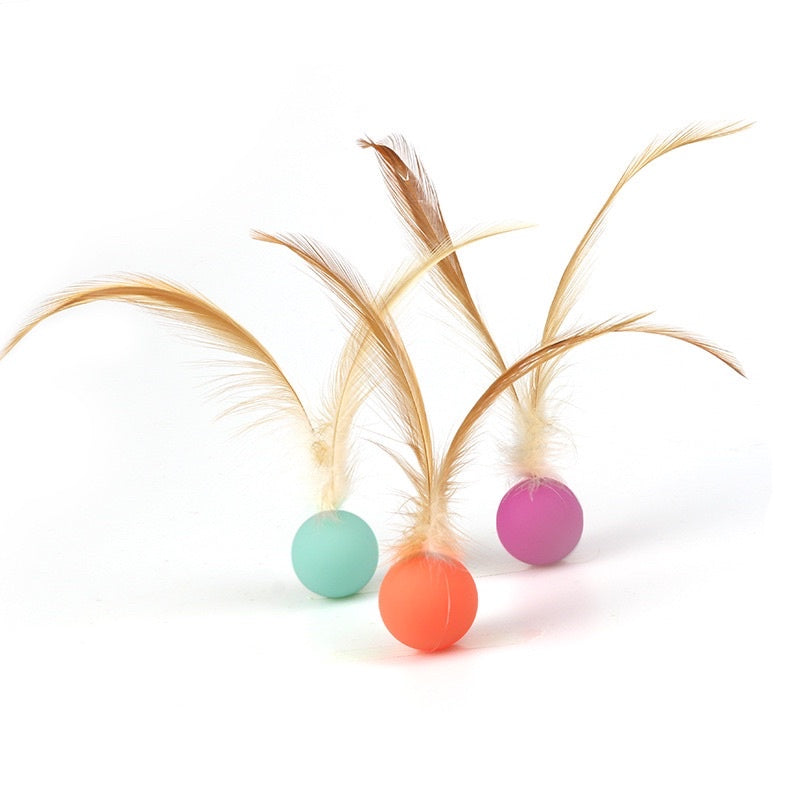 Cat toy chaser bouncing ball with feather 2.5cm pet toy